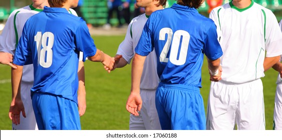 Soccer competition. Blue and white uniform. Sun weather. - Powered by Shutterstock