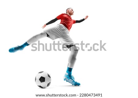 Soccer. The concept of sport. Professional soccer player hits the ball for the winning goal. Wide angle. View from below. Action
