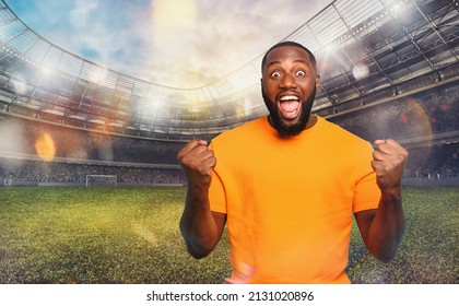 Soccer fan exults watching a football match at the stadium