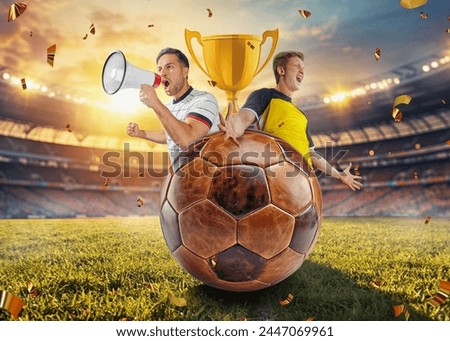 soccer fan with megaphone in hand and soccer player celebrating in soccer stadium.