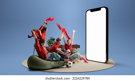 Soccer fans, win. Group of young emotional friends watching football match, sport show or movie together. Excited girls and boys sitting in front of huge 3D model of device screen at home interior - Shutterstock ID 2224229789