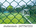 Soccer Field Behind Chain Link Fence