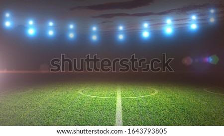 Soccer field and bright spotlights.
