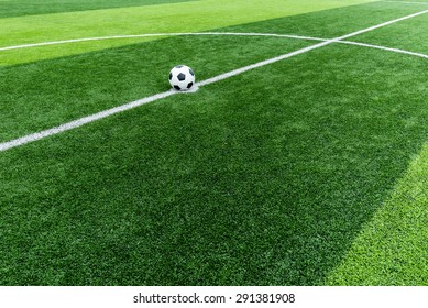 Soccer Field Grass With Ball At Kick Off Point.