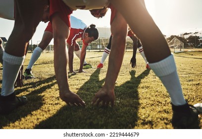 Soccer field, sports men and stretching body on sports stadium grass to start training, fitness and exercise workout. Football player team group warm up together before competition game performance - Powered by Shutterstock