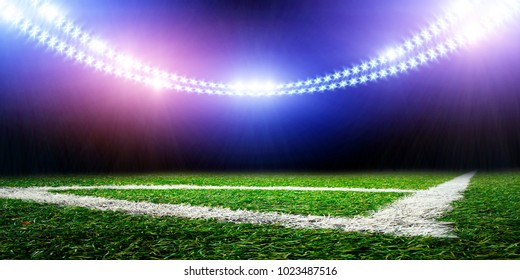 Soccer Field At Warm Summer Day And Blue Sky With Clouds