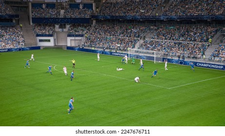 Soccer Football Championship Stadium with Crowd of Fans: Blue Team Attacks, Scores Goal, Players Celebrate Victory, Winners of Tournament. Sport Channel Broadcast Television. High Angle Wide Shot. - Shutterstock ID 2247676711