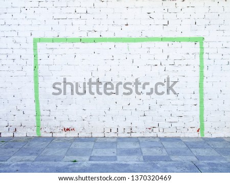 Soccer, football goal painted on a white wall