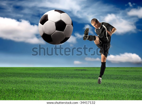 Soccer Football Player Kicking Ball Grass Stock Photo (Edit Now) 34417132