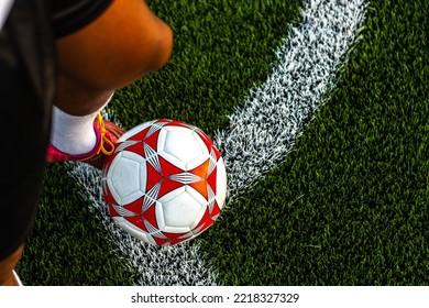 Soccer football sport background. soccer ball and soccer player with a ball on a soccer field - Shutterstock ID 2218327329