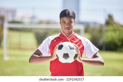 Soccer, football and sports with player, woman and athlete ready for a match, game or competition with ball on a pitch, field or stadium outdoor. Portrait of serious black female ready for training - Shutterstock ID 2191542517