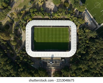 Soccer Football Stadium Top Down Overhead Aerial In Forrest Park. Green Grass Landmark Landscape Architecture Structure Stands Proffesional Football Club.