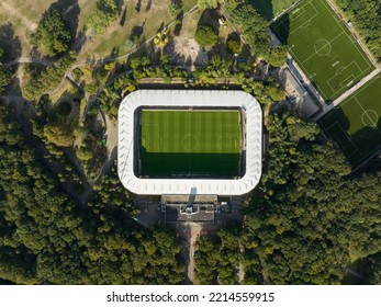 Soccer Football Stadium Top Down Overhead Aerial In Forrest Park. Green Grass Landmark Landscape Architecture Structure Stands Proffesional Football Club.