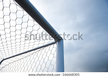 soccer goal against cloudy sky background. 