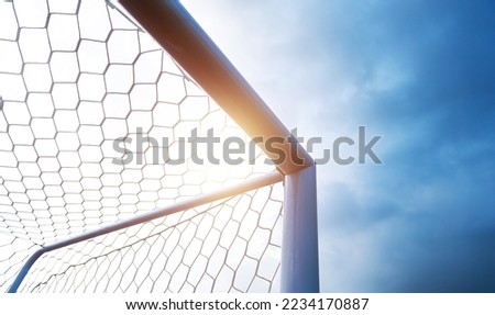 Soccer goal against cloudy sky