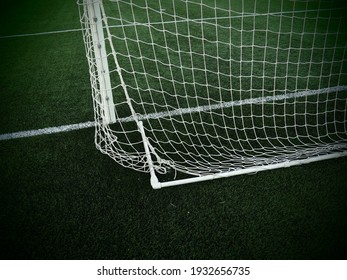 Soccer Goal Net With Grass Background. Football Field Markings And Stripes.