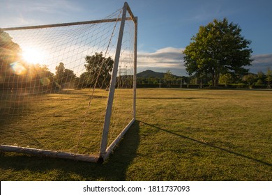 soccer goal with sun beam in the morning light