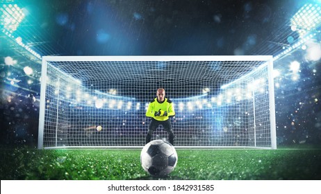 Soccer goalie ready to save a penalty kick at the stadium