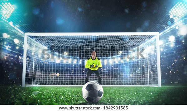 Soccer\
goalie ready to save a penalty kick at the\
stadium