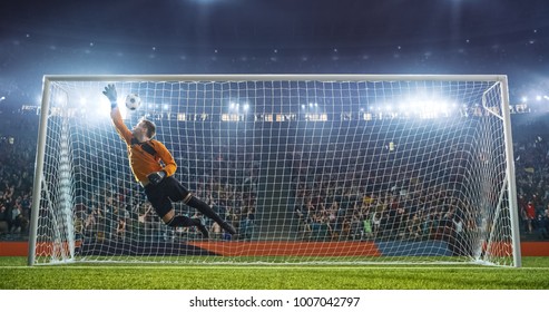 Soccer goalkeeper in action on the soccer stadium. He wear unbranded sports clothes. Stadium and crowd made in 3D. - Powered by Shutterstock