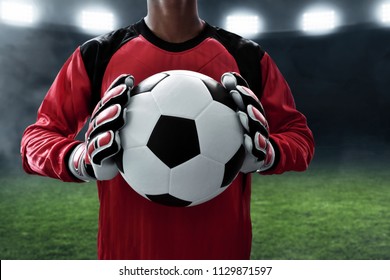 Soccer Goalkeeper Holding Soccer Ball