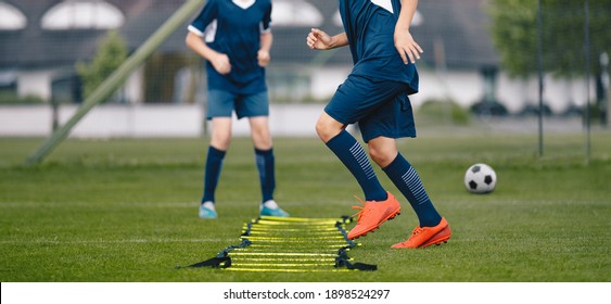 Soccer Ladder Drill. Young Football Boy Exercise On Ladder. Kids On Soccer Summer Camp 