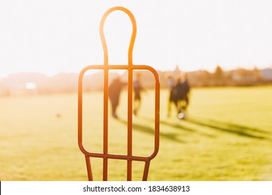 Soccer Metal Dummy. Football Free Kick Training Dummy. Sports Training Background. Soccer Team On Training Practice Session On Sunny Day. Football Players Running On Pitch In The Blurred Background