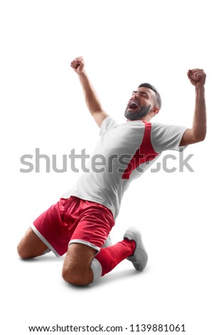 Soccer. One professional soccer player celebrate victory. Happy celebration. Isolated on white background
