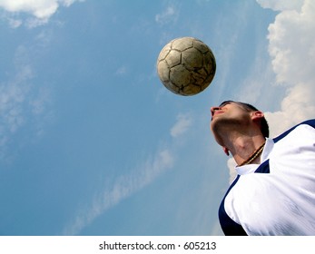 Soccer Player Heading The Ball