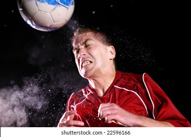 Soccer Player Hitting Ball With Head