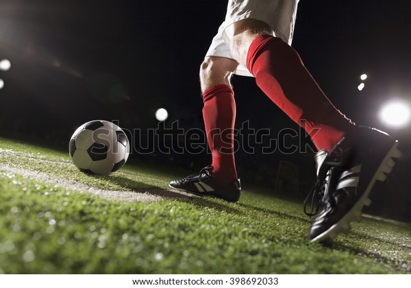 Soccer player making a corner
kick