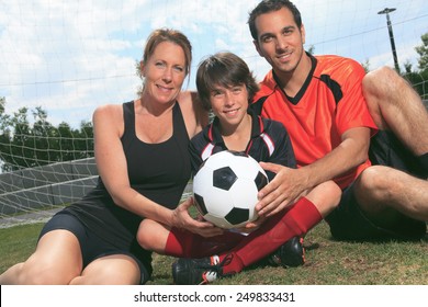 A Soccer Player On The Play Field.