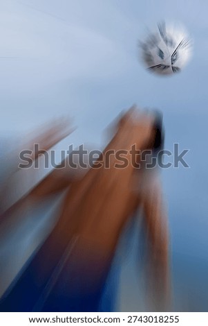 Soccer player performing dynamic kick on sandy beach, 35mm film scan with zoom motion blur, illustrating high-energy competition and summer trend.
