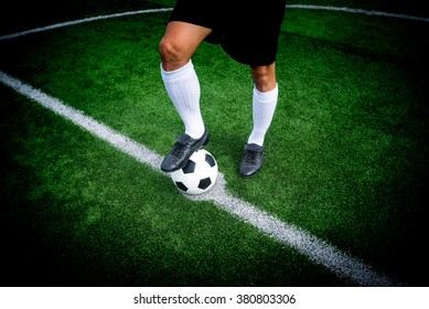 Soccer Player Ready To Play At Start Kick Off Point In Soccer Field.