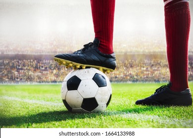 Soccer Player Standing With Soccer Ball Kick Off In The Stadium