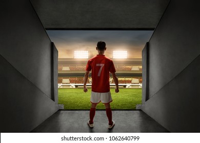 Soccer Player Standing On Stadium Entrance