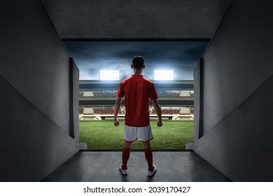 Soccer Player Standing On Stadium Entrance