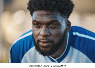 Soccer player, thinking or tired black man in sports training, game or match breathing on a field pitch. Face, fatigue or exhausted African athlete in football workout or fitness exercise on break - Powered by Shutterstock