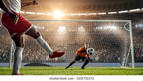 Soccer player is trying to score a goal while goalkeeper defends on a professional soccer stadium. Stadium and crowd are made in 3D. - Powered by Shutterstock