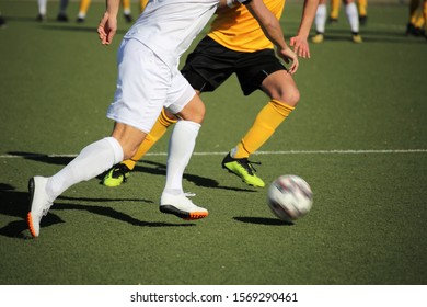 Soccer players in action, close-up - Powered by Shutterstock