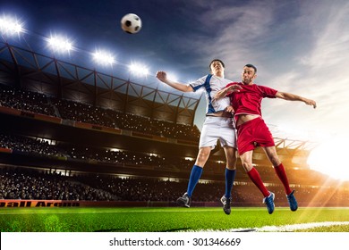 Soccer players in action on sunset stadium background panorama - Powered by Shutterstock