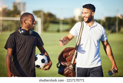 Soccer players, friends and men walking on football field after practice or fitness training on grass field. Diversity, smile and football players talking, bonding or discussion after sports workout. - Powered by Shutterstock