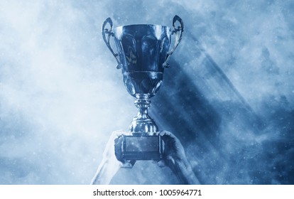 soccer players team group celebrating the victory and become champion of game while holding win coup - Shutterstock ID 1005964771