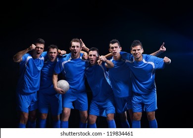 Soccer Players Team Group Celebrating The Victory And Become Champion Of Game While Holding Win Coup