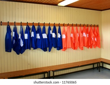 Soccer Practice Vests Hanging In A Locker Room