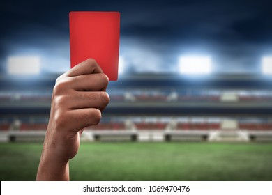 Soccer Referee Hand Holding Red Card