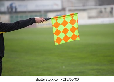 Soccer Referee Hold The Flag. Offside Trap