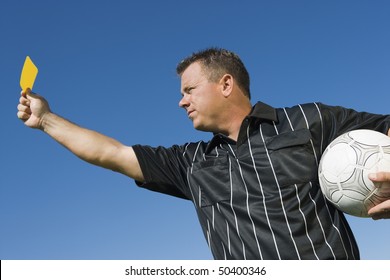 Soccer Referee Holding Yellow Card, Portrait