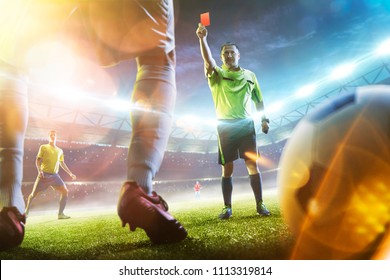 Soccer Referee Showing A Red Card