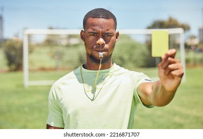 Soccer, Referee And Yellow Card With A Black Man Booking A Player On A Grass Pitch Or Field During A Game. Fitness, Football And Discipline With A Male Ref Giving A Caution During A Sports Match